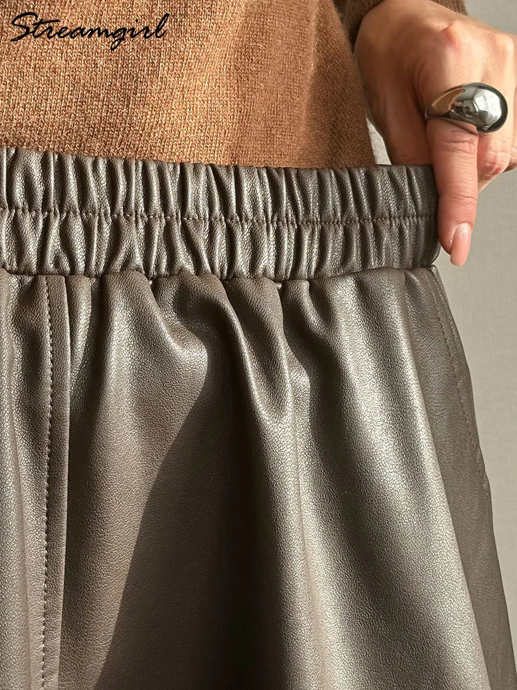 Leather A-Line Midi Skirt - Elastic Waist With Pockets